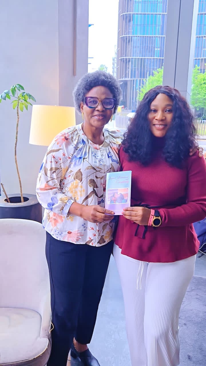 Sandra Oluwatosin Eshemokai O. sharing Beyond Motherhood and Creativity with a reader